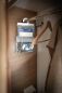 Preview: Luftentfeuchter Absodry Hanger aufgehangen in einem Kleiderschrank